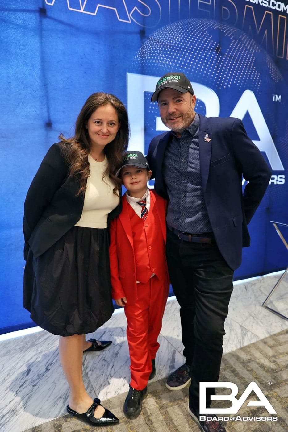 Mike Weiss with his wife Carolyne and their son at a Board of Advisors event