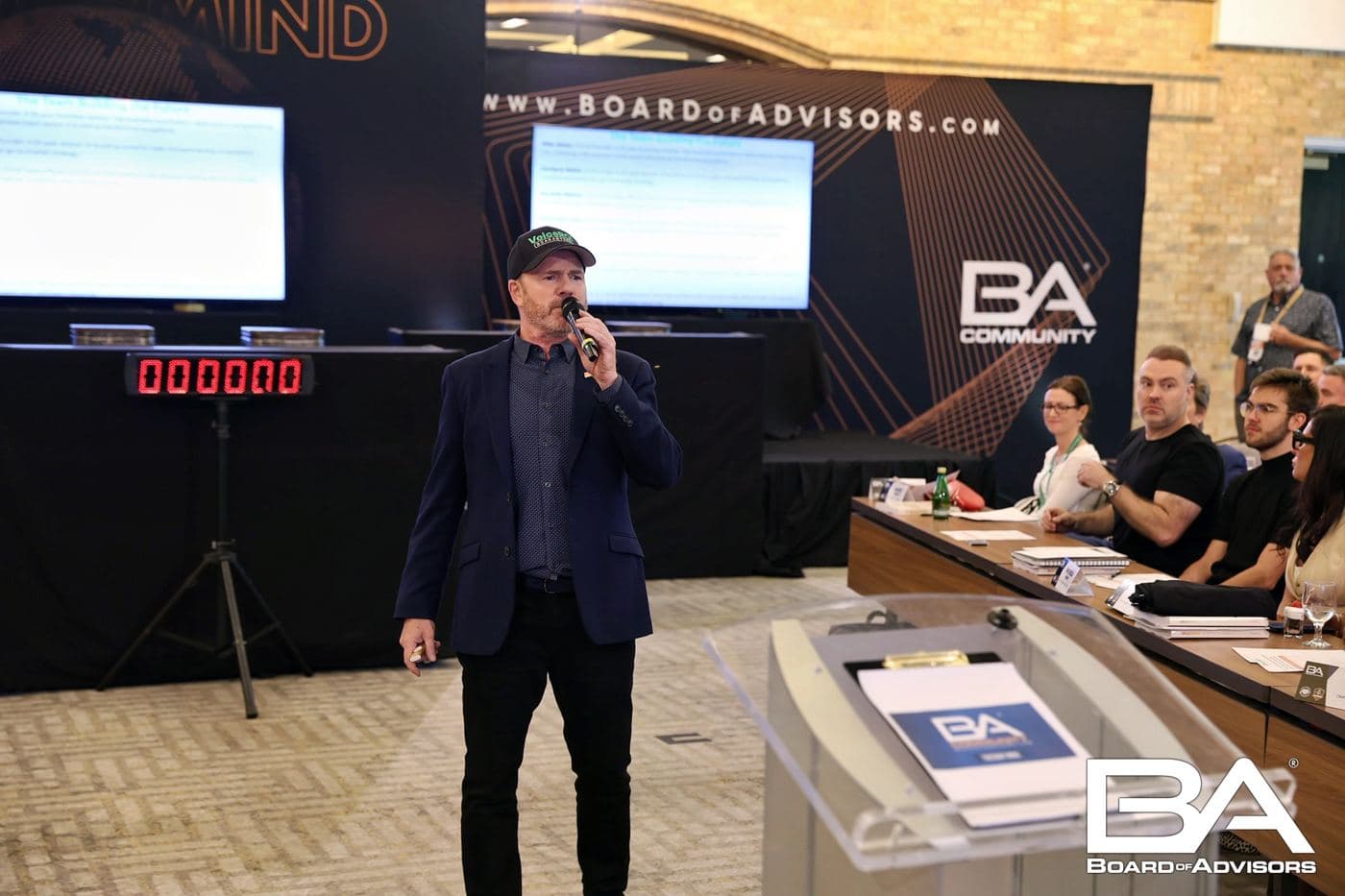 On stage at a Board of Advisors mastermind.