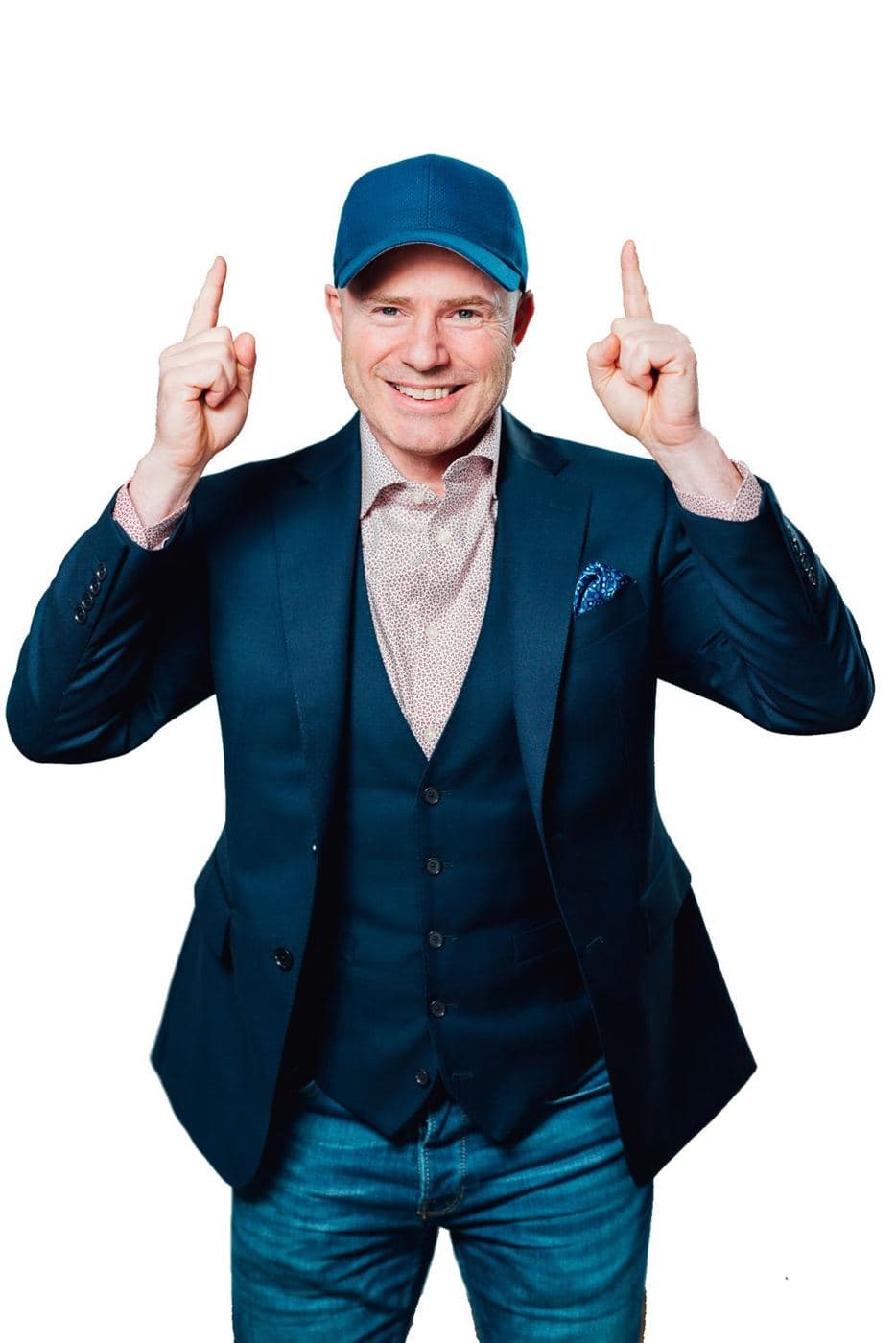 Mike Weiss in a blue cap and navy vest, pointing both index fingers up